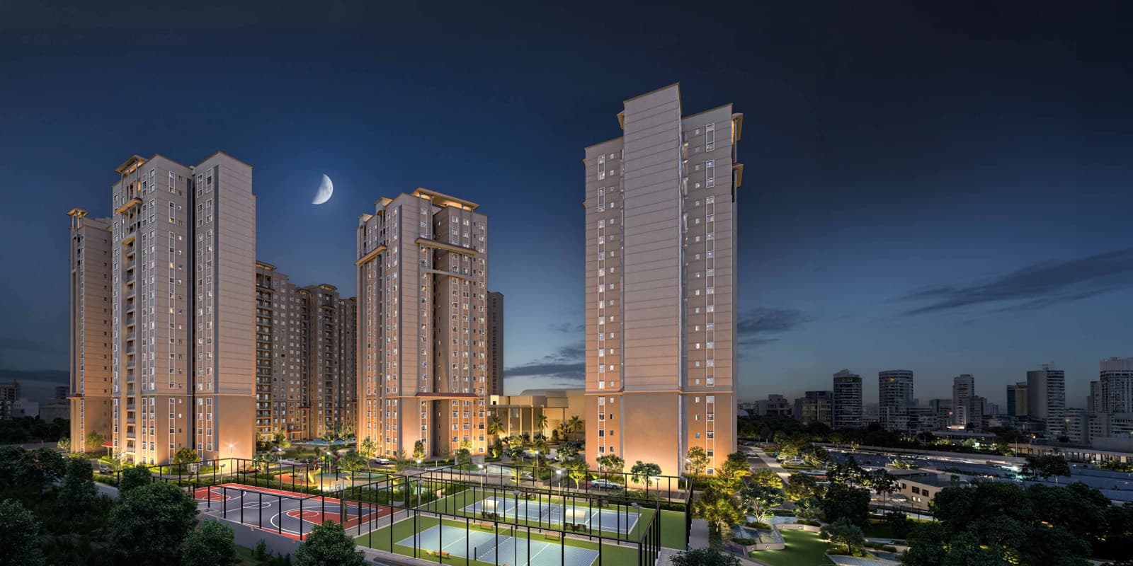 Ramky Fortuna towers at night under a crescent moon