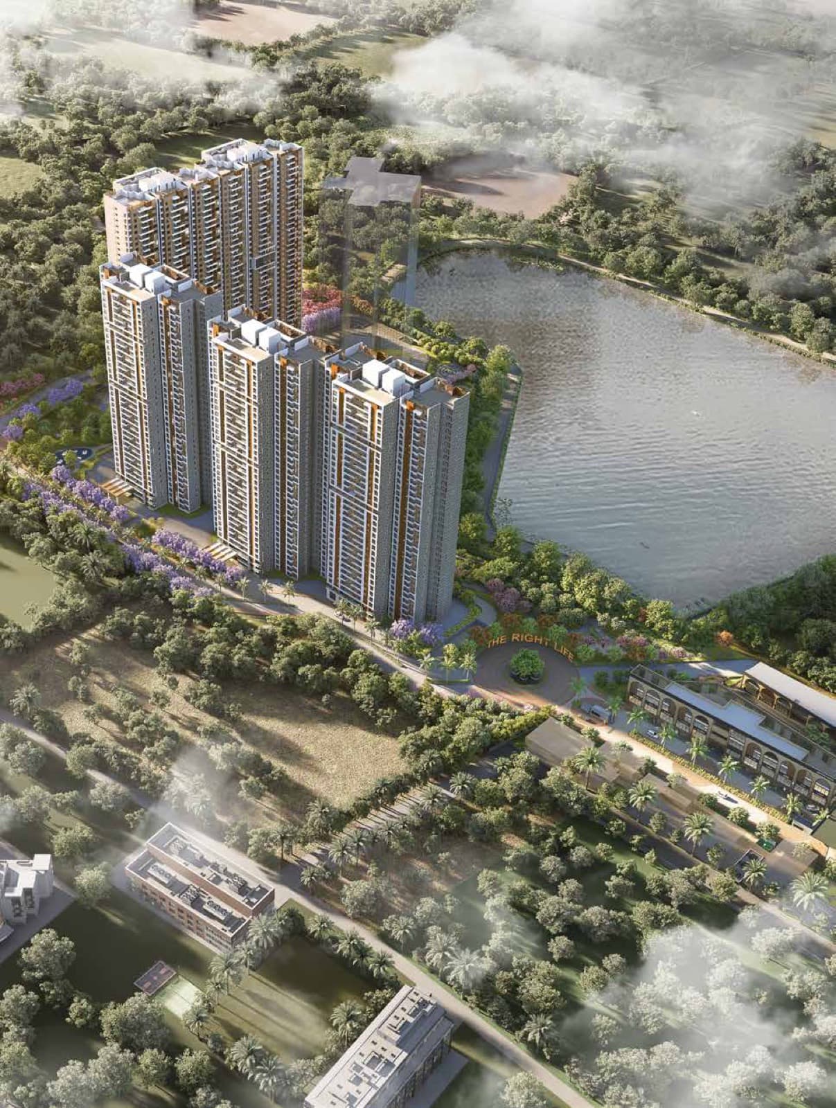 Aerial view of The Right Life towers rising beside the lake